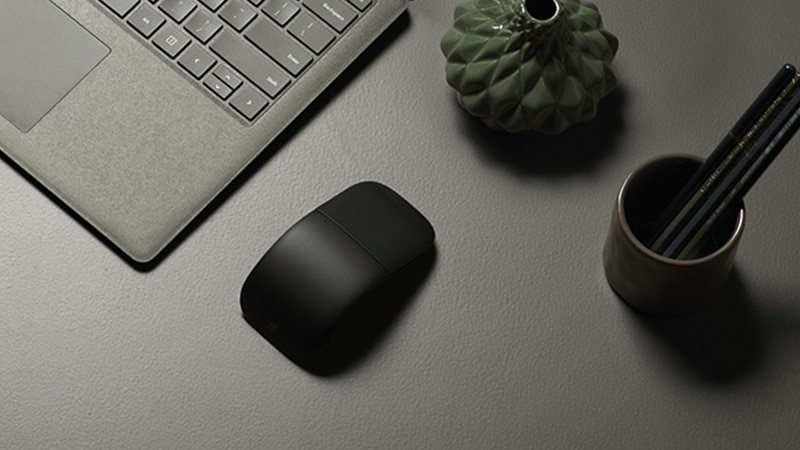 The new Microsoft Arc Mouse on a desk