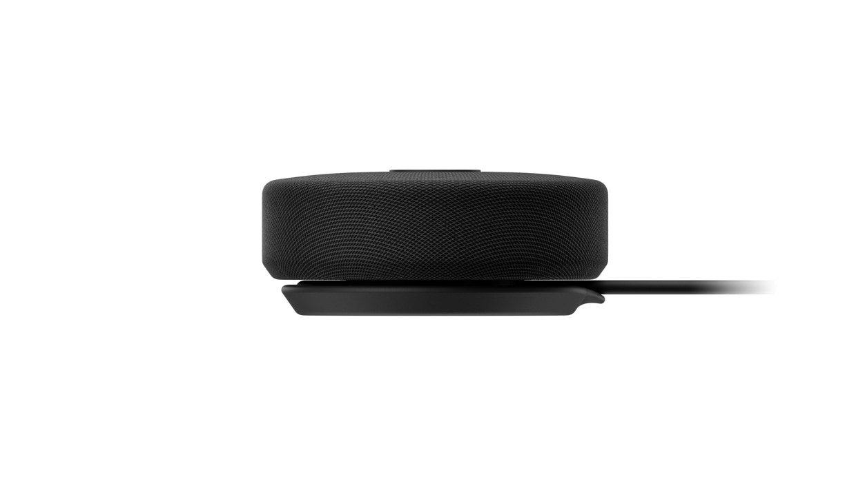 Profile view of the Microsoft Modern USB-C Speaker with cord in sight.