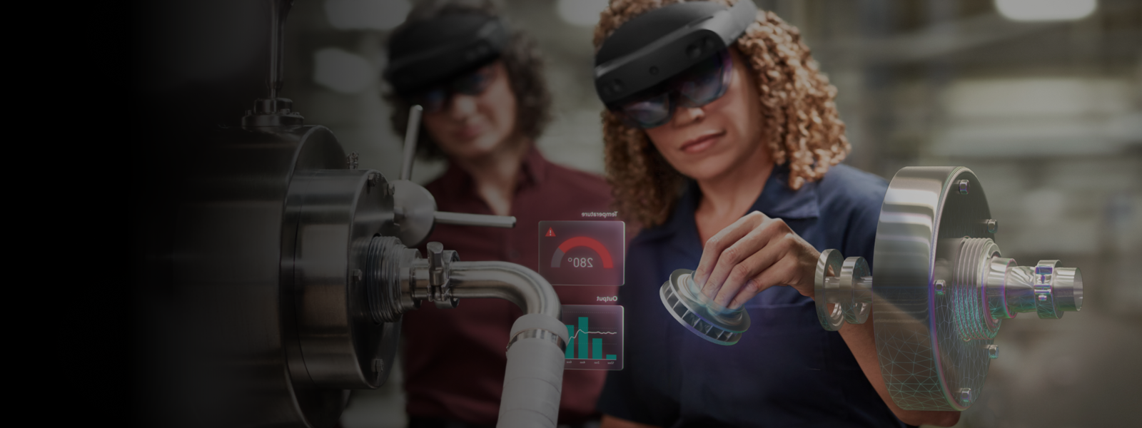 Two people wearing HoloLens 2 and working in mixed reality.