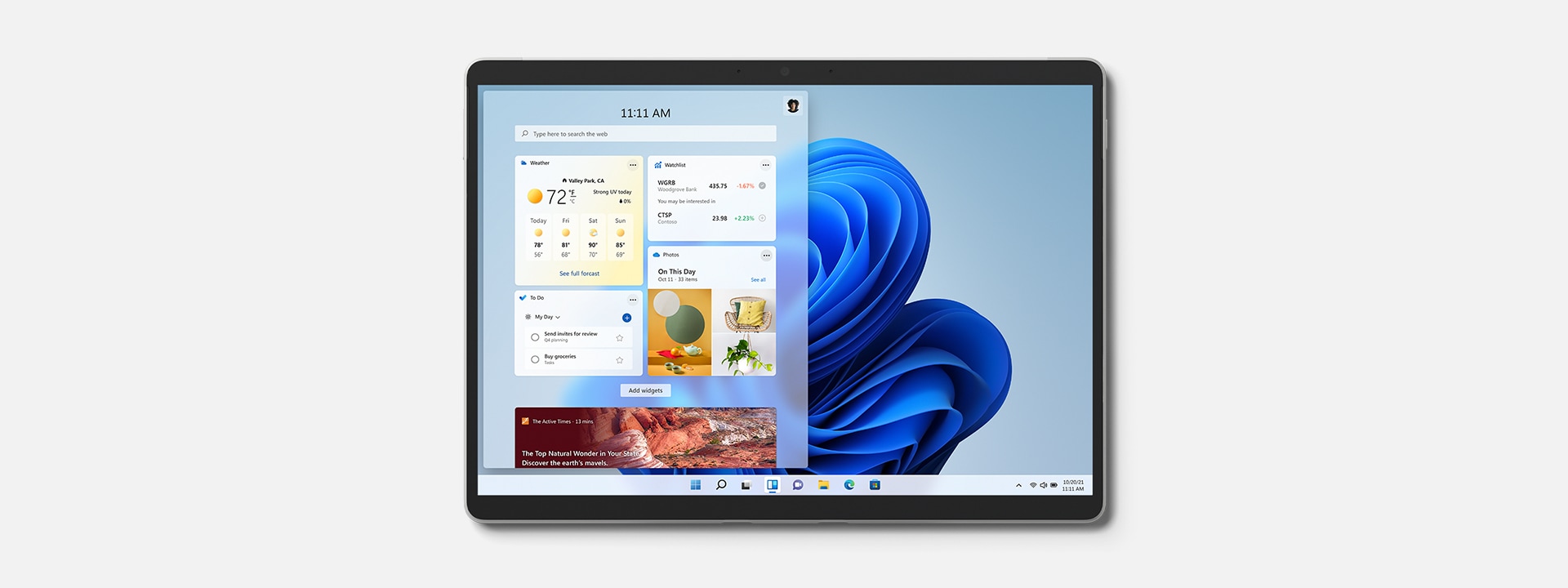 Surface Pro 8 showing featured Windows 11 widgets.