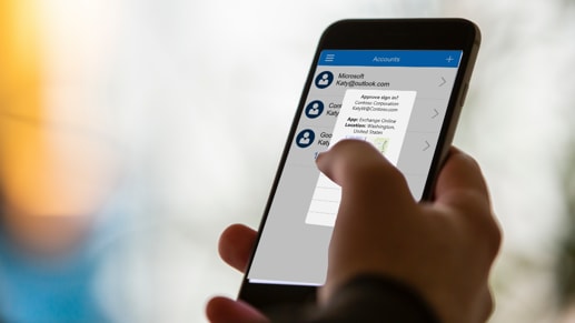 A mobile phone prompting the user to approve a sign in on the Accounts page in Authenticator.