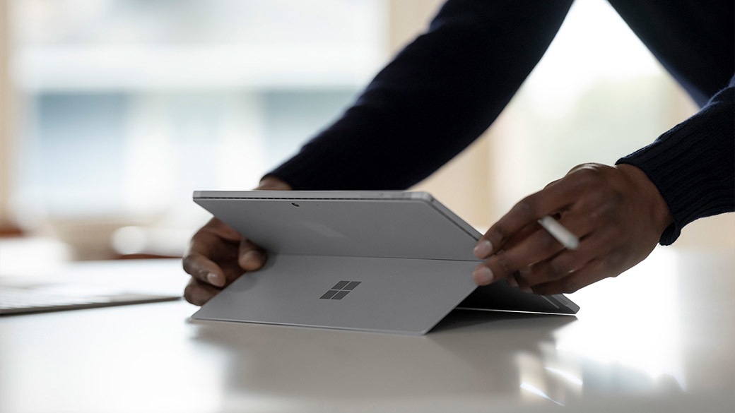 Surface Pro 7+ shown from behind in kickstand mode.