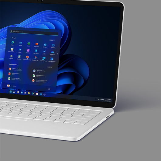 A laptop displaying the Windows 11 start screen