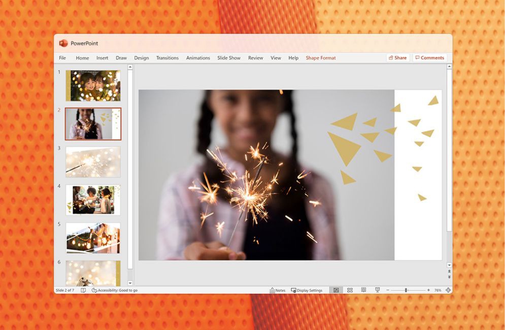 A PowerPoint presentation featuring a child holding up paper snowflakes.
