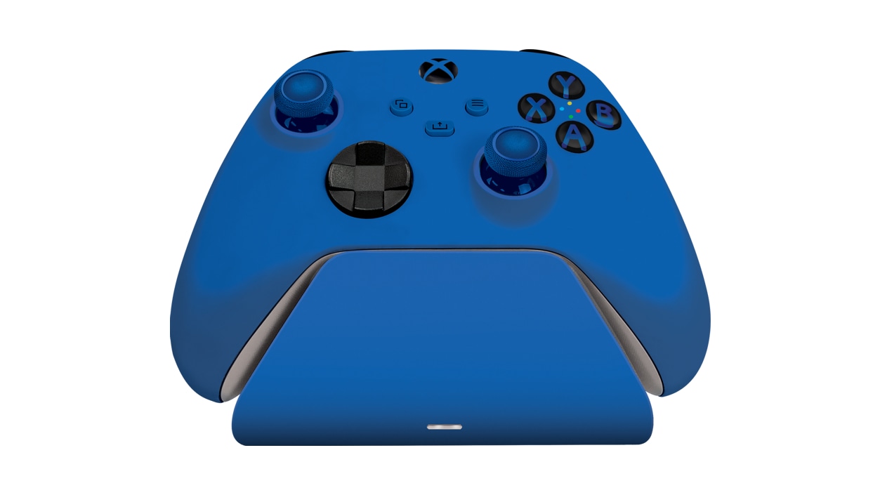 Front view of the Razer Universal Quick Charging Stand for Xbox in Shock Blue with an Xbox Wireless Controller attached to it.