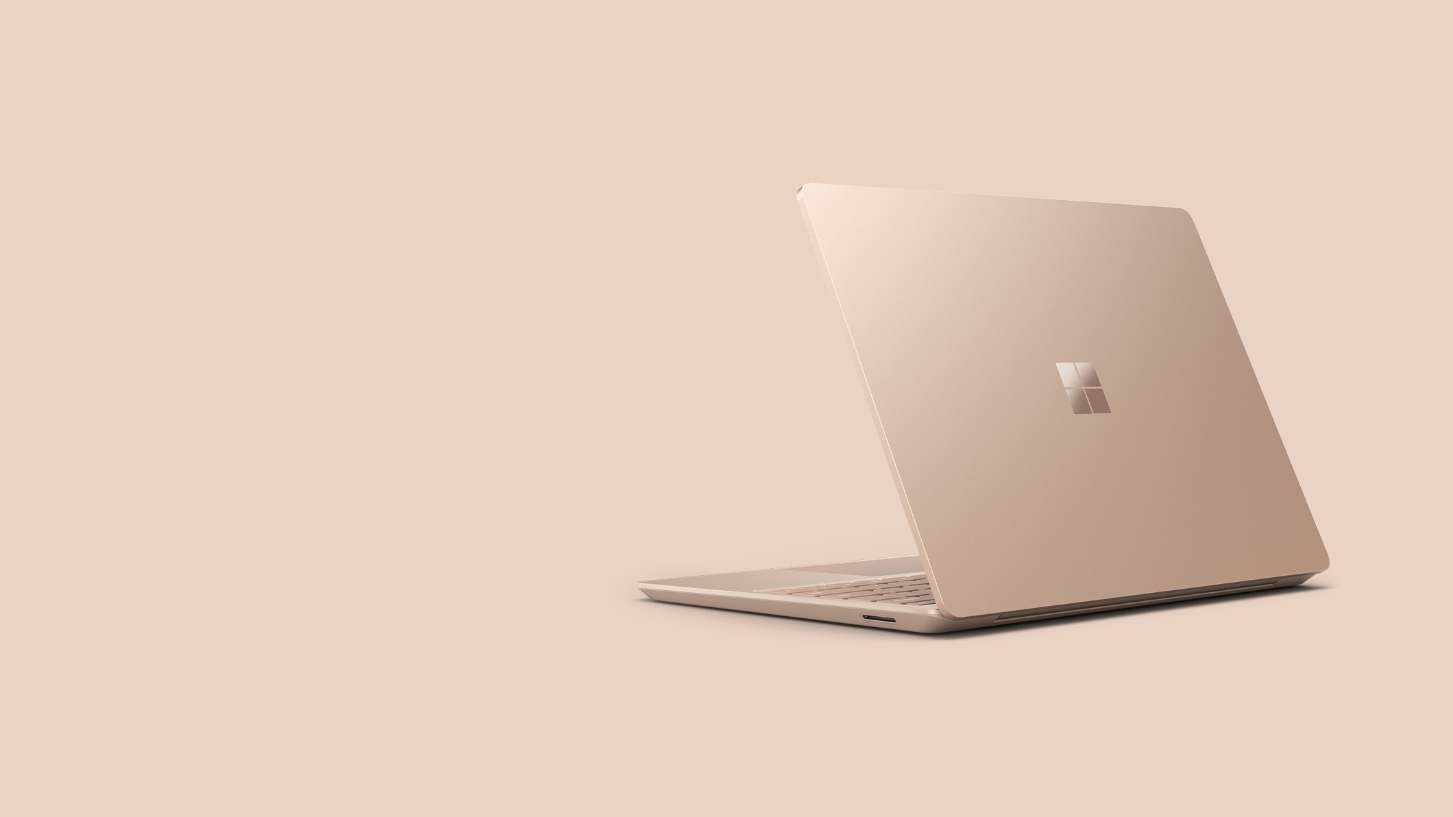 Surface Laptop Go 2 for Business in the colour Sandstone.