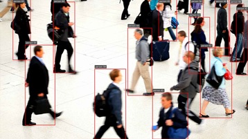 A program identifying people walking in a busy space.