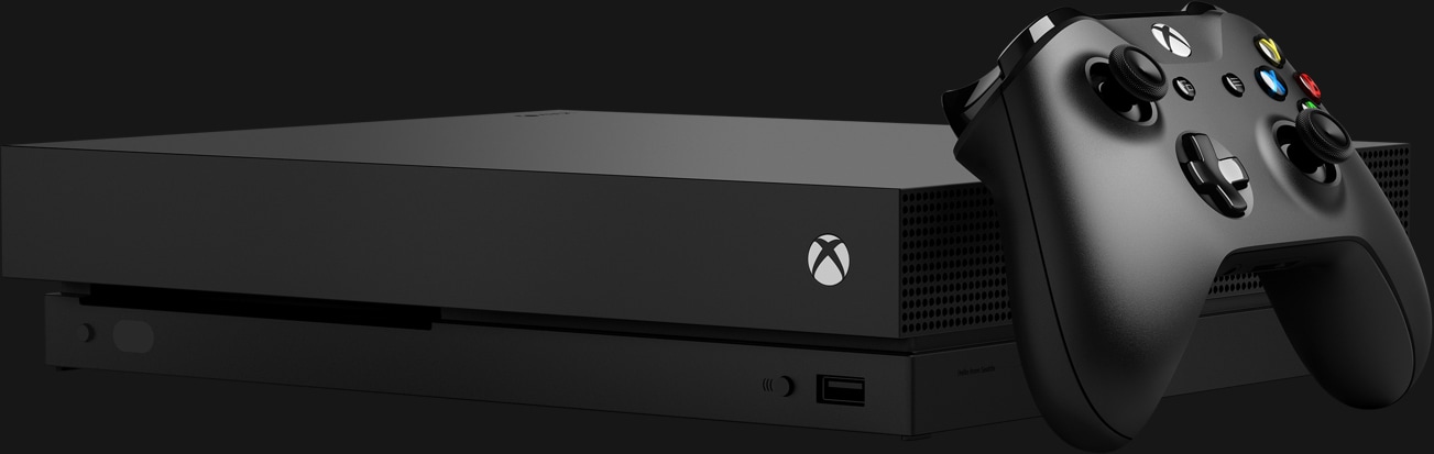 Front of Xbox One X console with controller