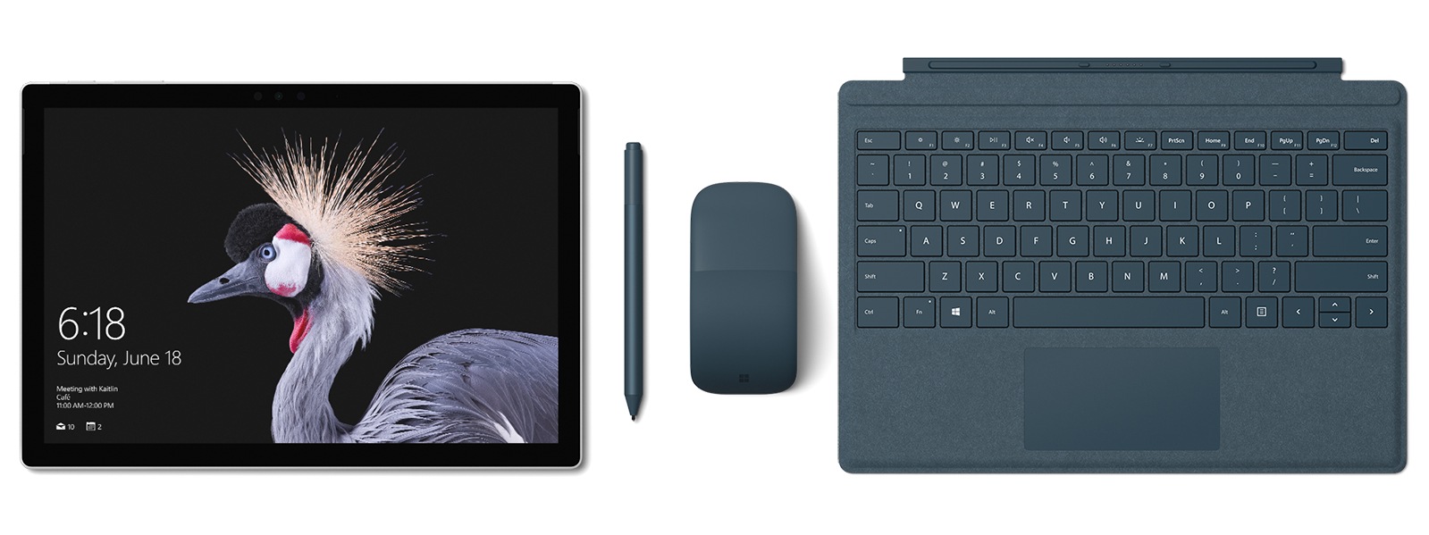 Surface Pro, mouse, keyboard, and blue type cover