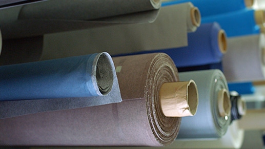 Rolls of Alcantara fabric in different colors
