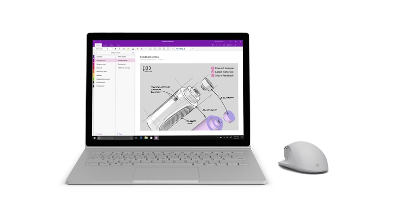 Surface Precision Mouse next to a Surface Book 2 running OneNote