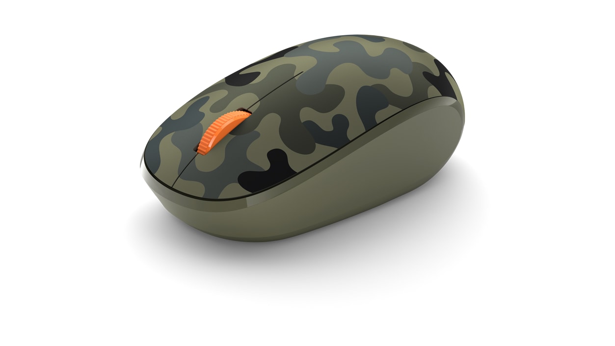 Angled view of Forest Camo mouse highlighting thumb contour and finger dial.