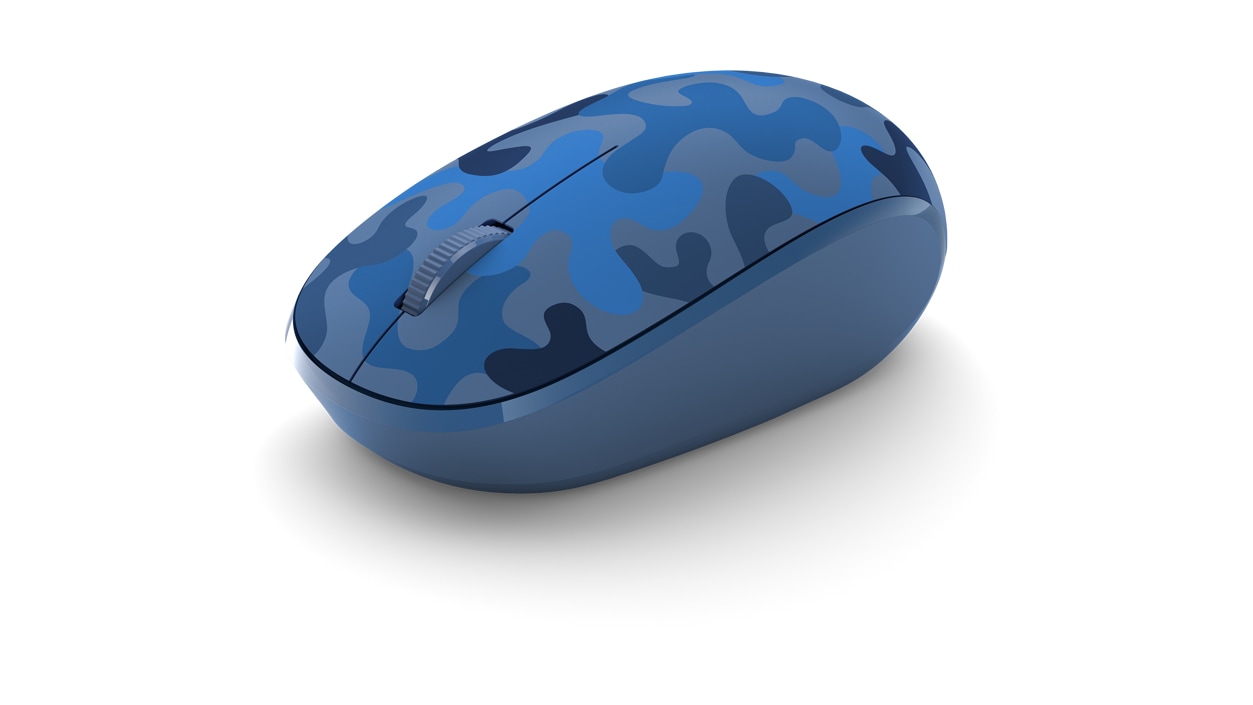 Angled view of Nightfall Camo mouse highlighting thumb contour and finger dial.