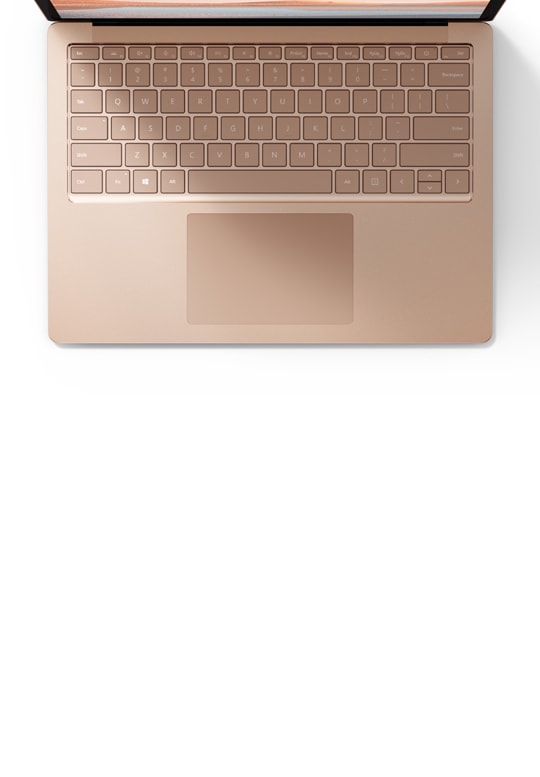 滑らかなサンドストーン メタル素材の Surface Laptop 4 のクローズアップ