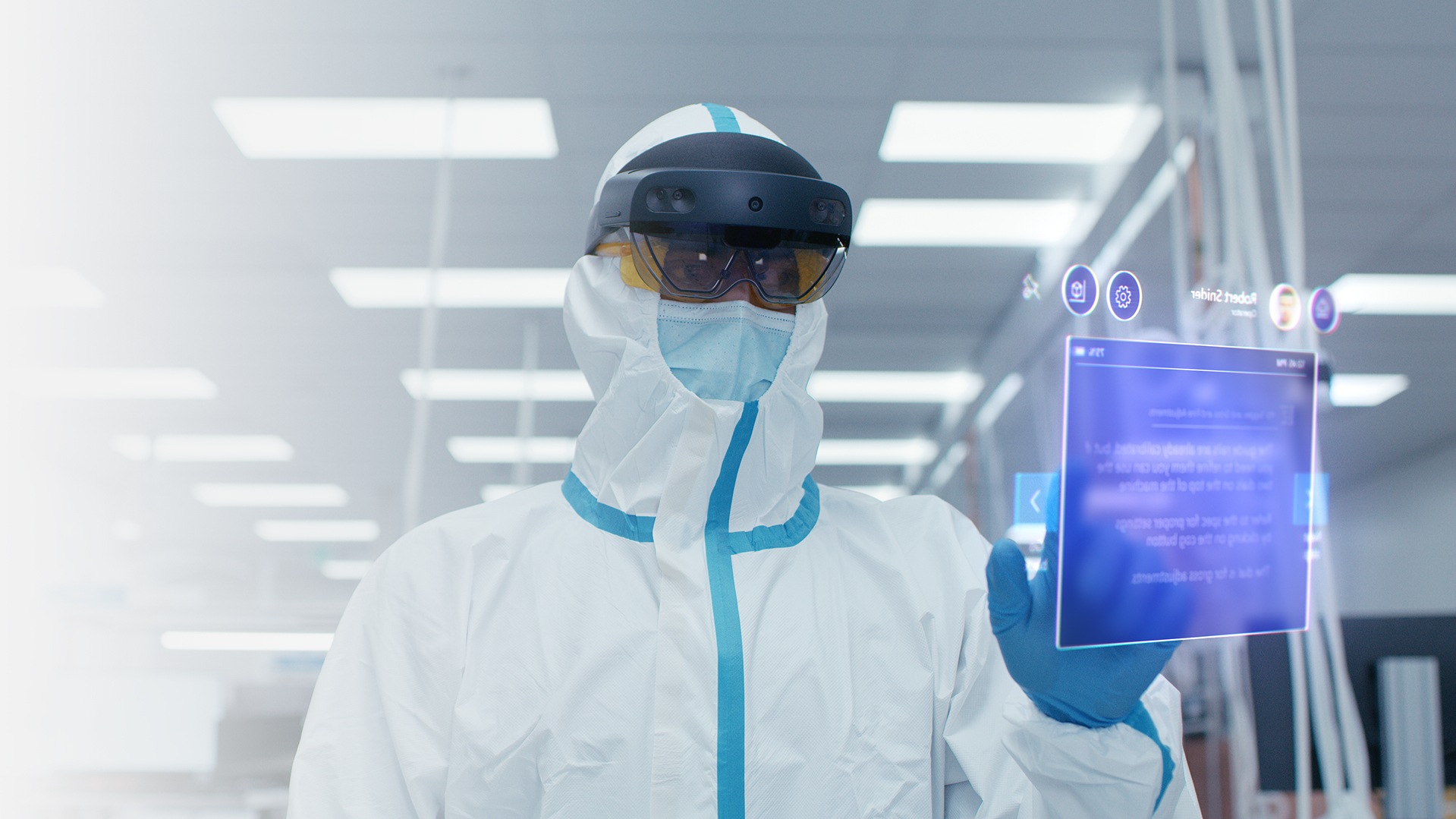 Person in a hazmat suit wearing HoloLens 2 Industrial Edition device.